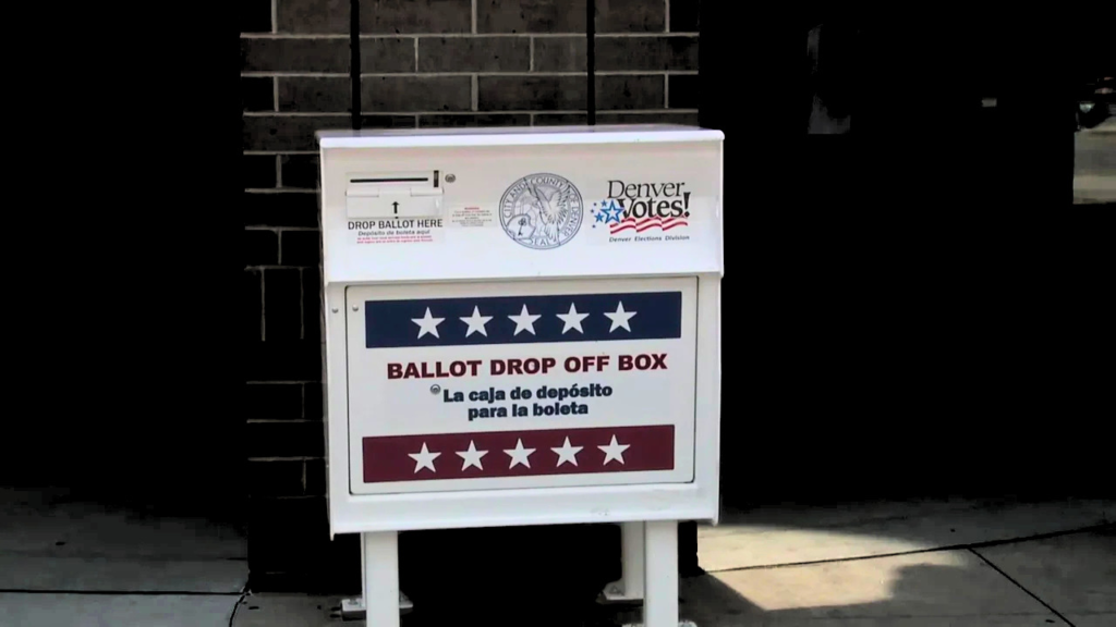 An official Denver Votes ballot drop box outside a public building, where voters can securely return completed mail ballots on Election Day.
