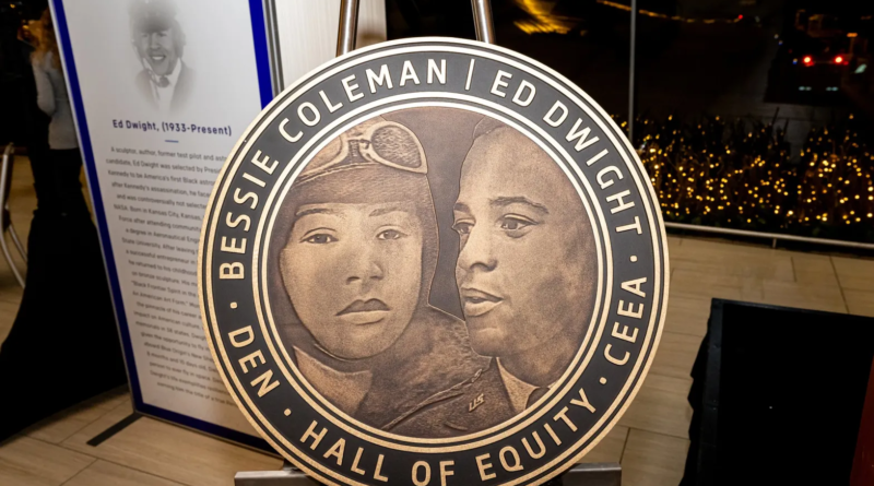 Close-up of the Hall of Equity commemorative medallion featuring Bessie Coleman and Ed Dwight, honoring two aviation pioneers at Denver International Airport's Center for Equity and Excellence in Aviation.