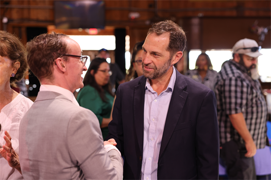 Attendees speak with recruiters and explore career opportunities during Congressman Jason Crow's annual job fair in Aurora, where more than 60 employers and community organizations connected with job seekers from across the region.