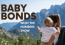 A parent holding a young child against a Colorado mountain landscape, overlaid with the words “Baby Bonds: What the Numbers Show.”