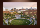 Architectural rendering of a proposed mixed-use development near Denver’s Burnham Yard, featuring a landscaped public park, pedestrian walkways, residential buildings and the downtown Denver skyline.