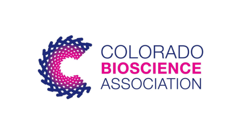 Colorado BioScience Association logo featuring a circular woven design in navy blue and magenta beside the organization's name in matching colors on a white background.